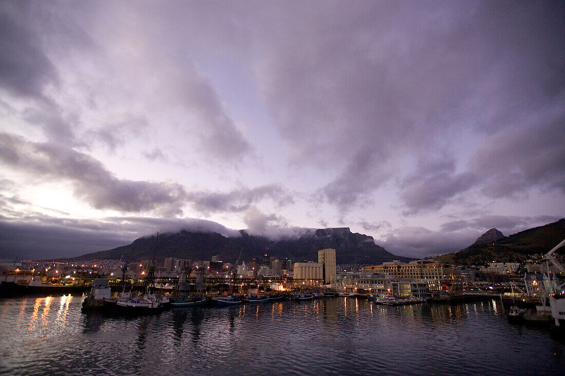 A night view of Cape Town harbor, the Victoria and Alfred Waterfront and Table Mountain, Cape Town, South Africa. Photo by Jonathan Kingston/Aurora