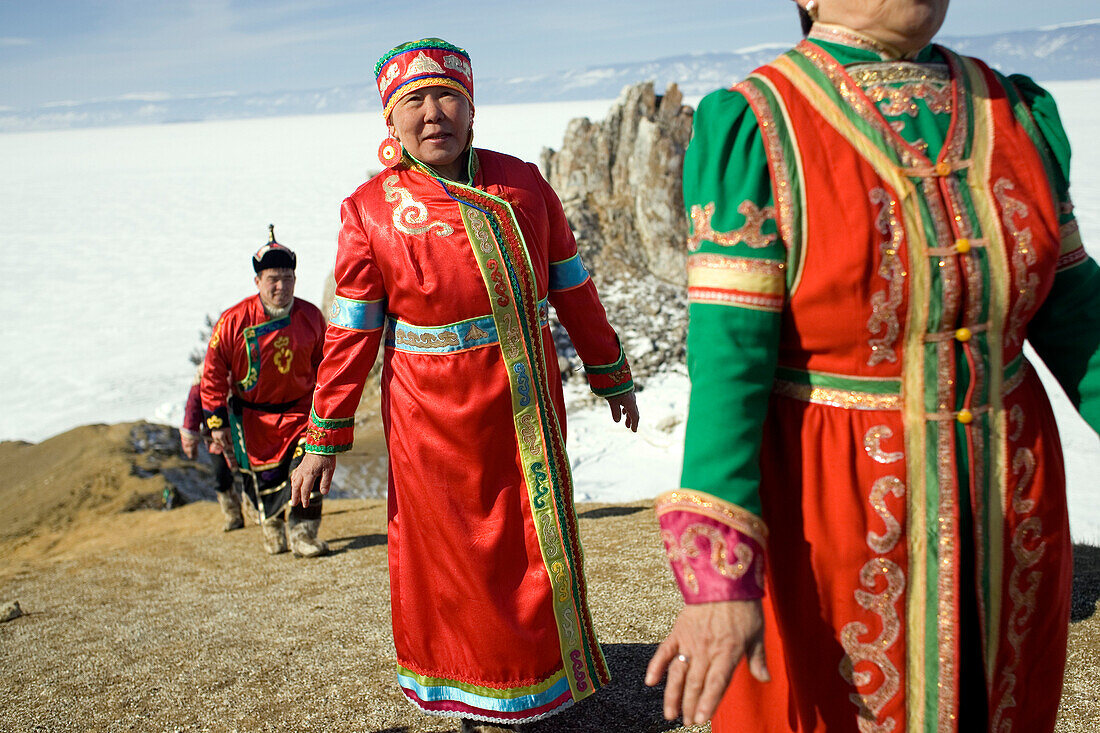 OLKHON ISLAND, SIBERIA, RUSSIA- MARCH 13, 2007: The members of a Buryat wedding making the precession up the island after the ceremony on Olkhon Island, Siberia, Russia on March 13, 2007