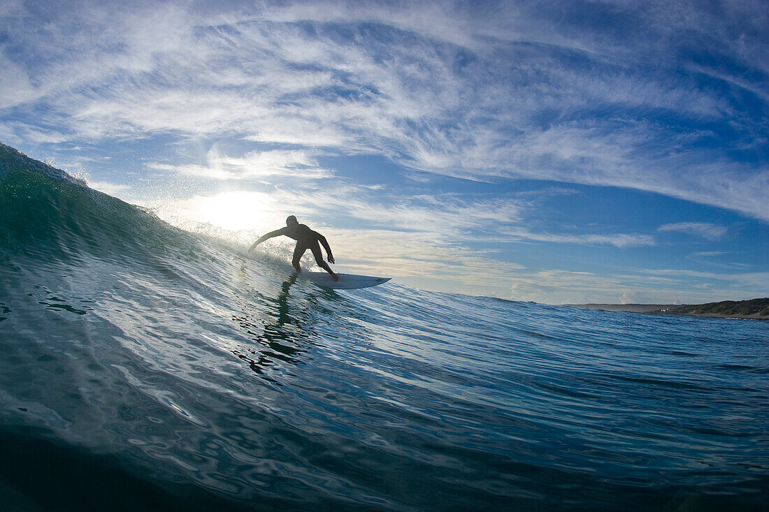 Michael Richmond surfing against the backlite at Phoques beach, during the Musica Surfica - Free Friction surf event on King Island