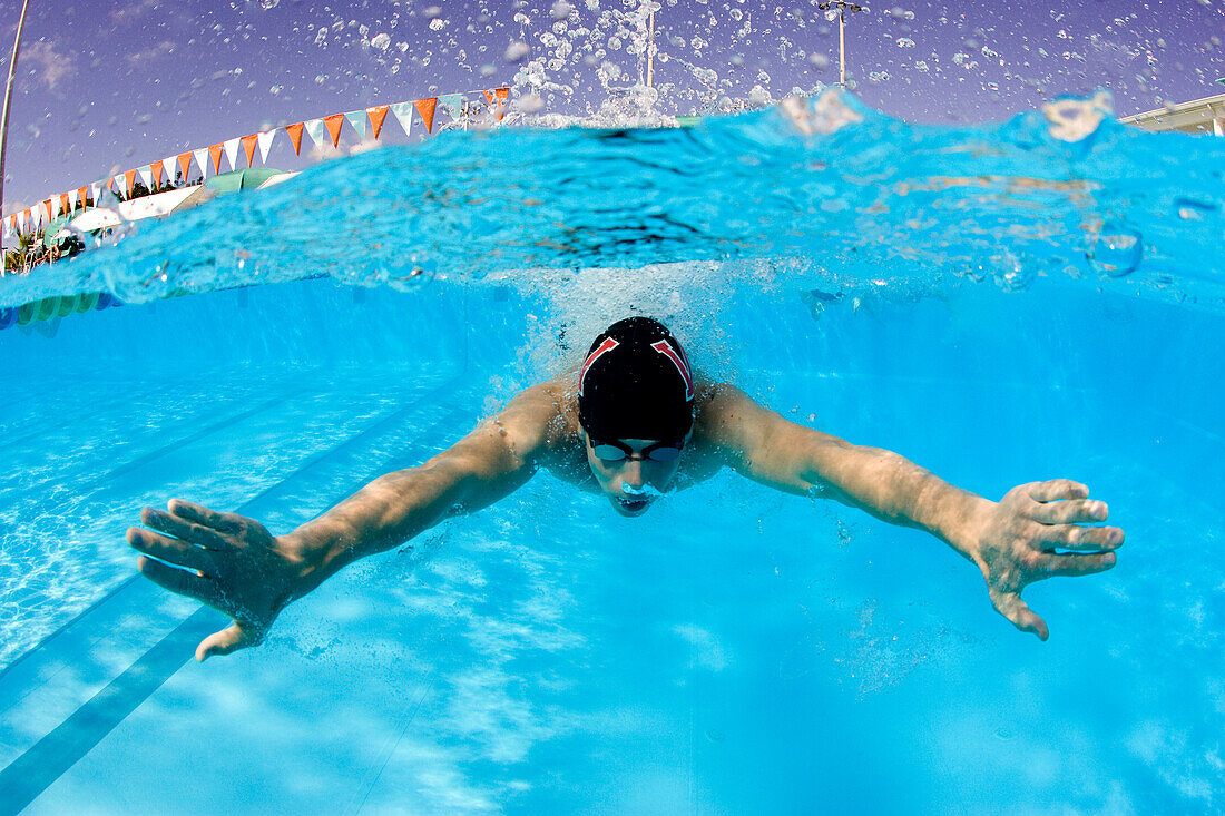 Unidentified swimmer during the Orange Bowl Swimming Classic dive and swimming competition in Key Largo, Florida.  The event features some of the nation's finest collegiate swimmers and divers.  The event is held annually at the Jacobs Aquatic Center in K