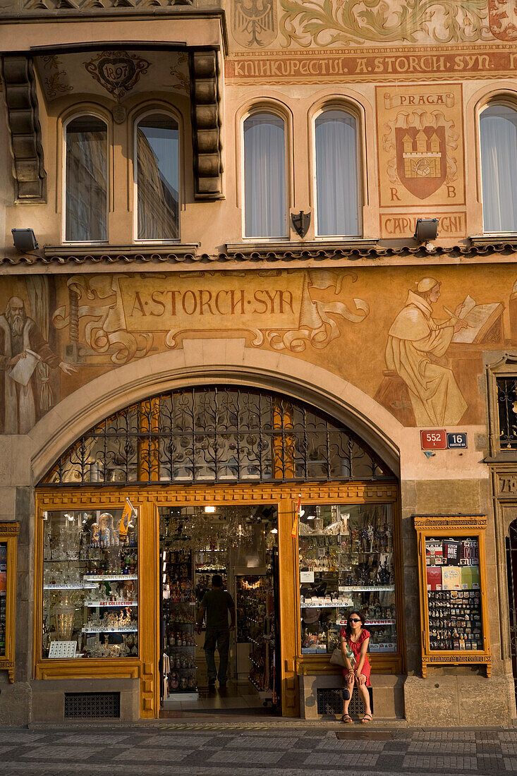 Store in the ground level of Storch House in Old Town Square, Prague, Czech Republic. Late 19th Century painting cover this ornate neo-Renaissance building, also known as At the Stone Madonna.