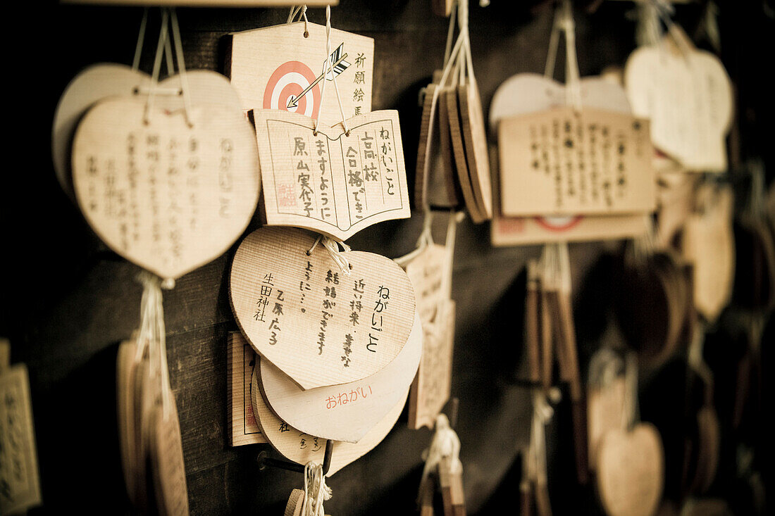 Prayers Ema, at the Ninomiya Shrine in Kobe, Japan.  The shrine is located in the heart of downtown and offers a peaceful respite from the commotion of the city.