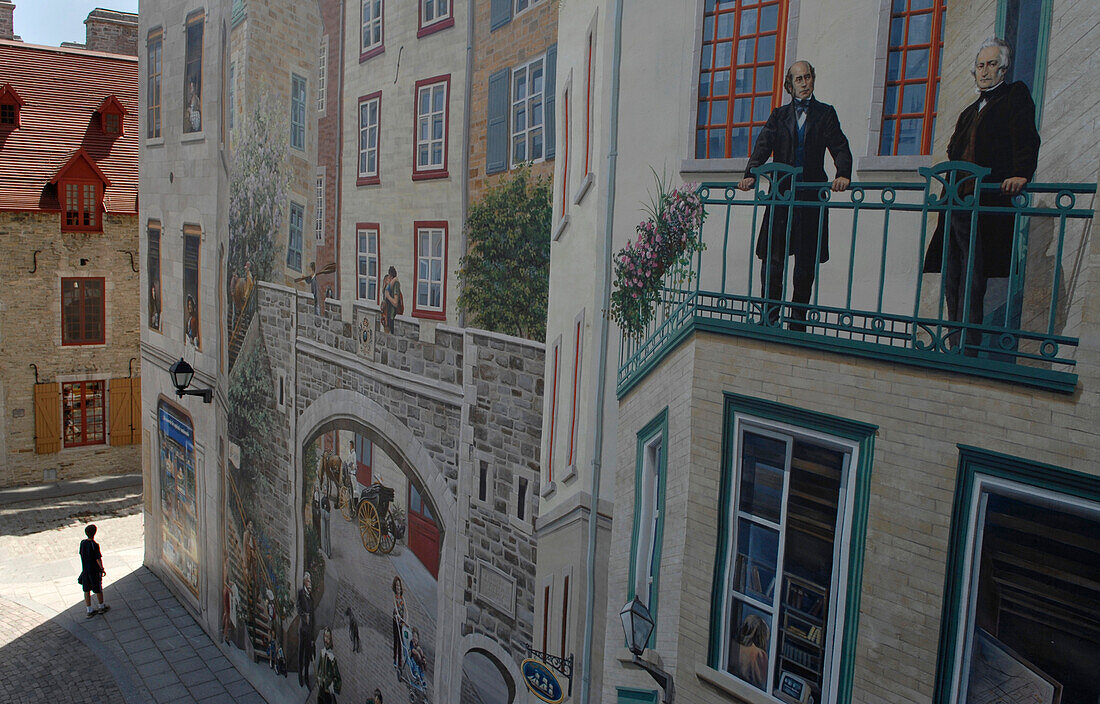 Mural with child in Quebec City Canada.  The child is a US tourist.