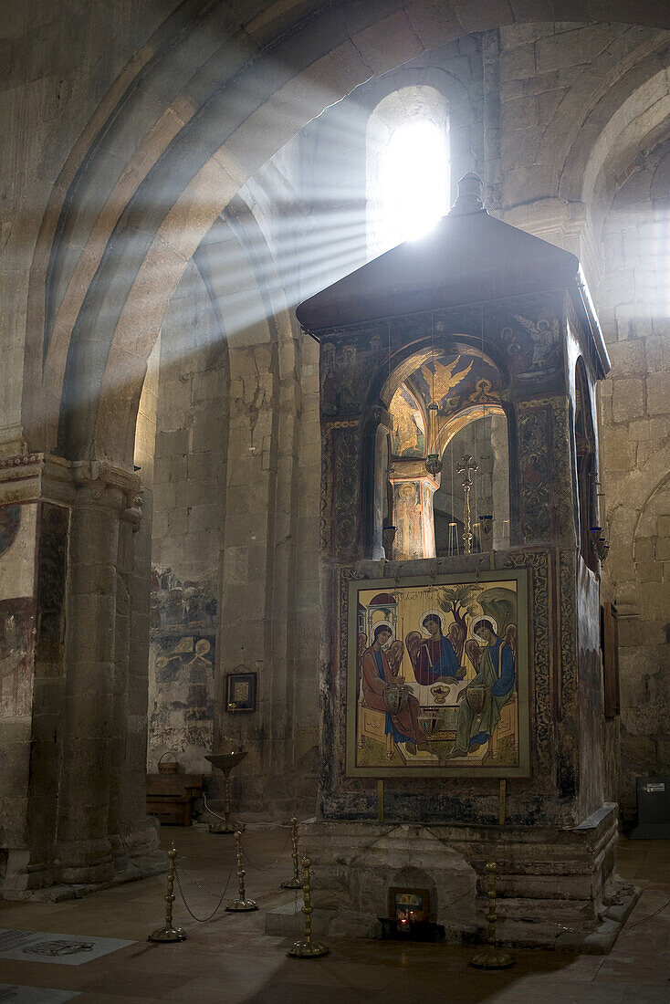 Mtskheta, Georgia - January, 2008: Light streaming into the 12th century Cathedral of Sveti-Tskhoveli in Mtskheta.  Mtskheta lies on the banks of the Mtkvari river and is a UNESCO world heritage site, containing some of the olders churches in the Caucasus