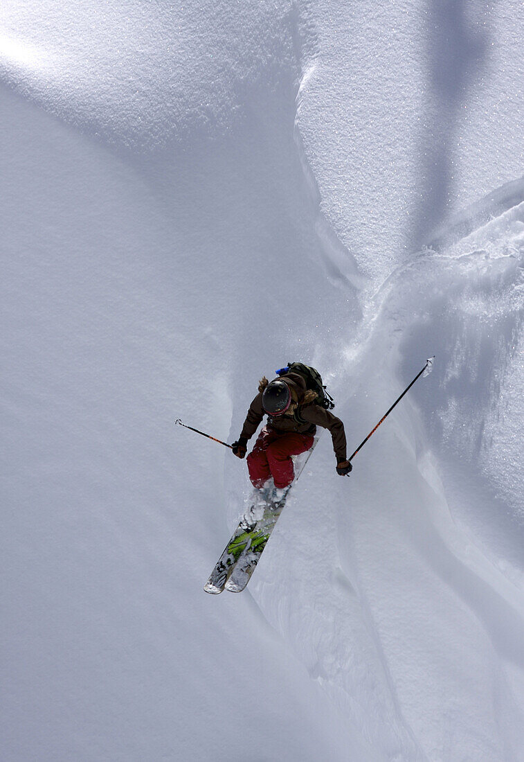 A skier catches air off a cornice at Alta Ski Area near Salt Lake City, UT