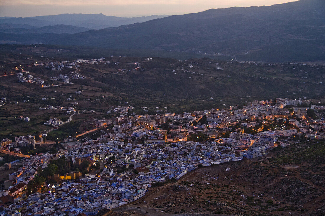 The town of Chefchaouen, Morocco, at the base of the Rif Mountains, glistens at  twilight on October 28, 2007.