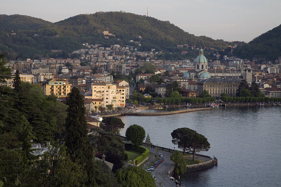 Como at dusk as seen from a nearby hillside, Como, Italy.