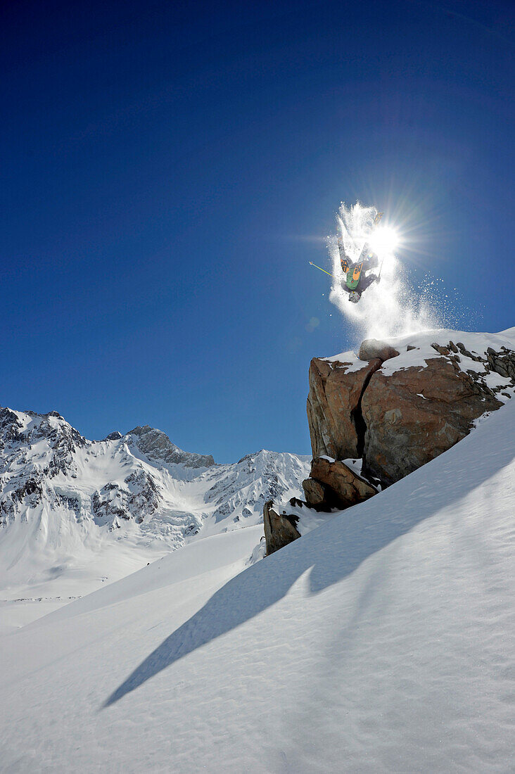 Back flip in front of the sun, Puma Lodge, Chile