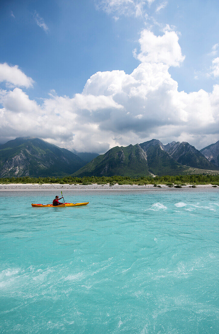 Kayak on the blue waters of the Talgliamento, Tolmezzo, Italy