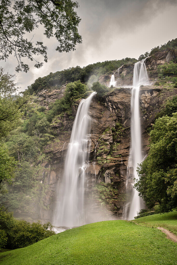 The two cascades of waterfall Cascata dell' acquafraggia, Lake Como, Lombardy, Italy