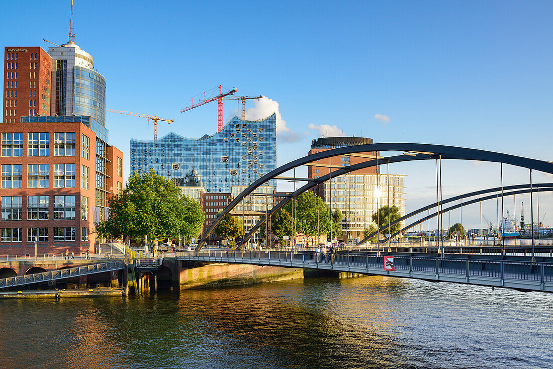 Bridge Niederbaumbruecke with Elbphilharmonie in background, Warehouse district, Speicherstadt, Hamburg, Germany