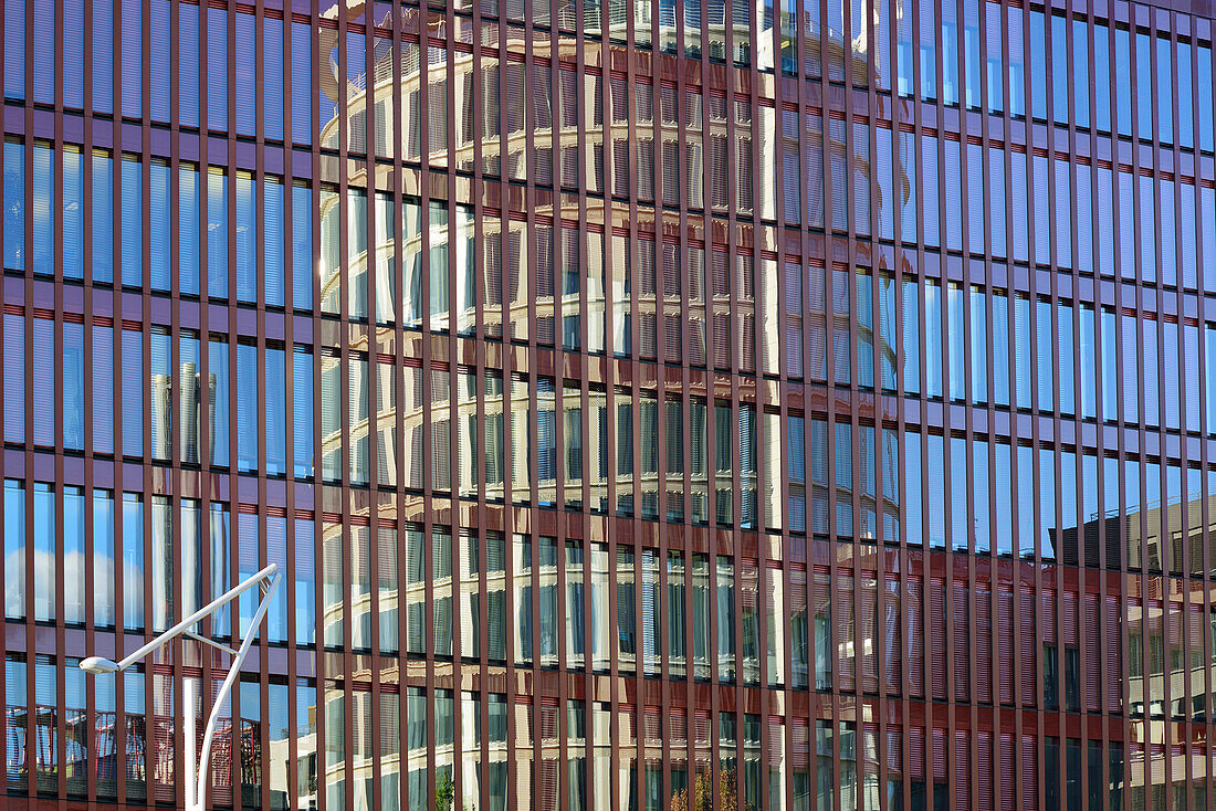 Facade of Coffee Plaza reflecting in glass front, Sandtorpark, Hafencity, Hamburg, Germany