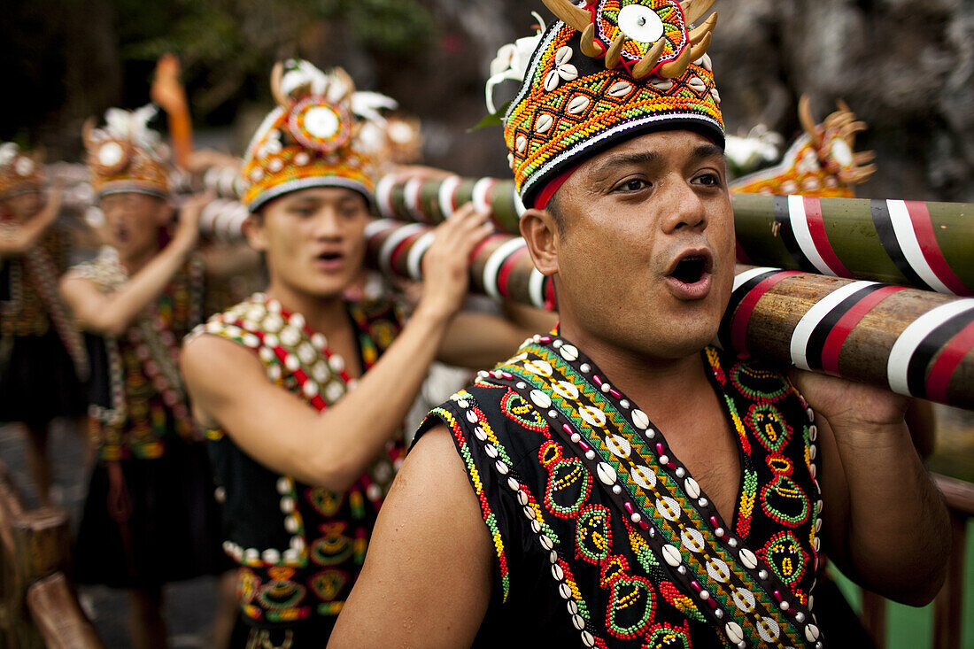 Aboriginal dancers sing as they enter a performance at Formosan Aboriginal Village, Taiwan, October 21, 2010.  Established to preserve the culture, traditions and history of Taiwan's native aboriginal people, the park is a popular spot for visitors hoping