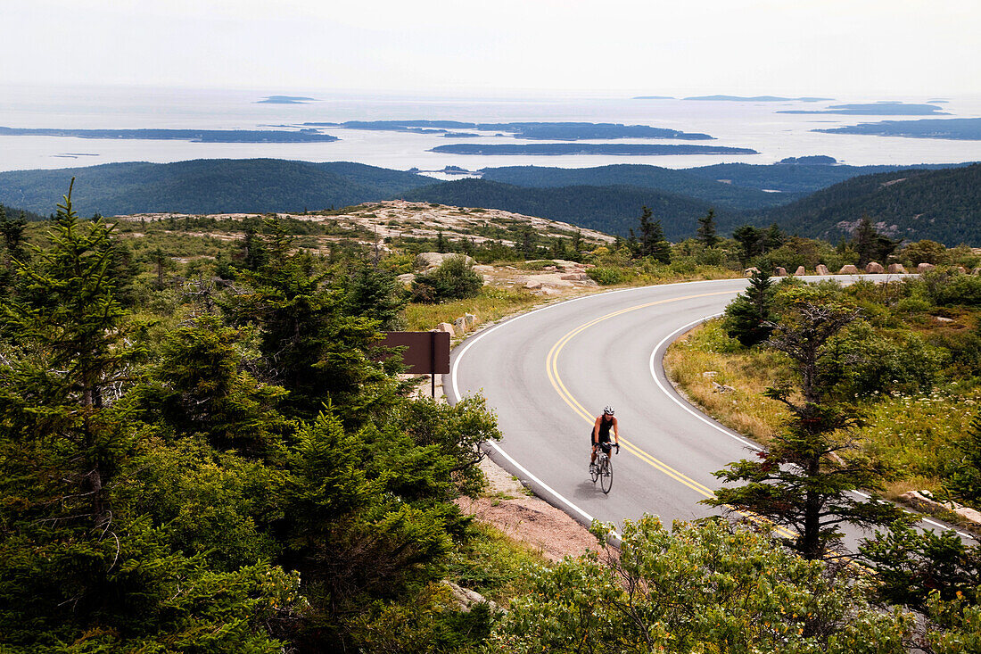 ACADIA NATIONAL PARK, MAINE, USA. A winding road up to Cadillac Mountain overlooking the coast.