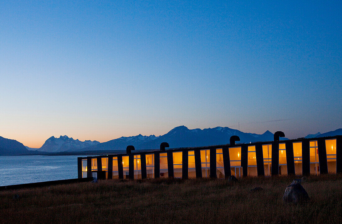 PUERTO NATALES, PATAGONIA, CHILE. A fancy hotel at dusk. Remota, the hotel, is one of the nicest in the area boasting some of the most unique architecture in all of Chile.