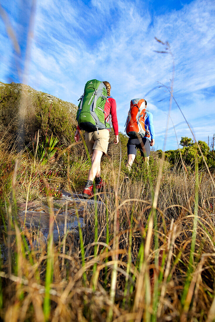 Katrin Schneider and Susann Scheller hiking on the Hoerikwaggo Trail from Cape Point to Table Mountain in Cape Town. South Africa.