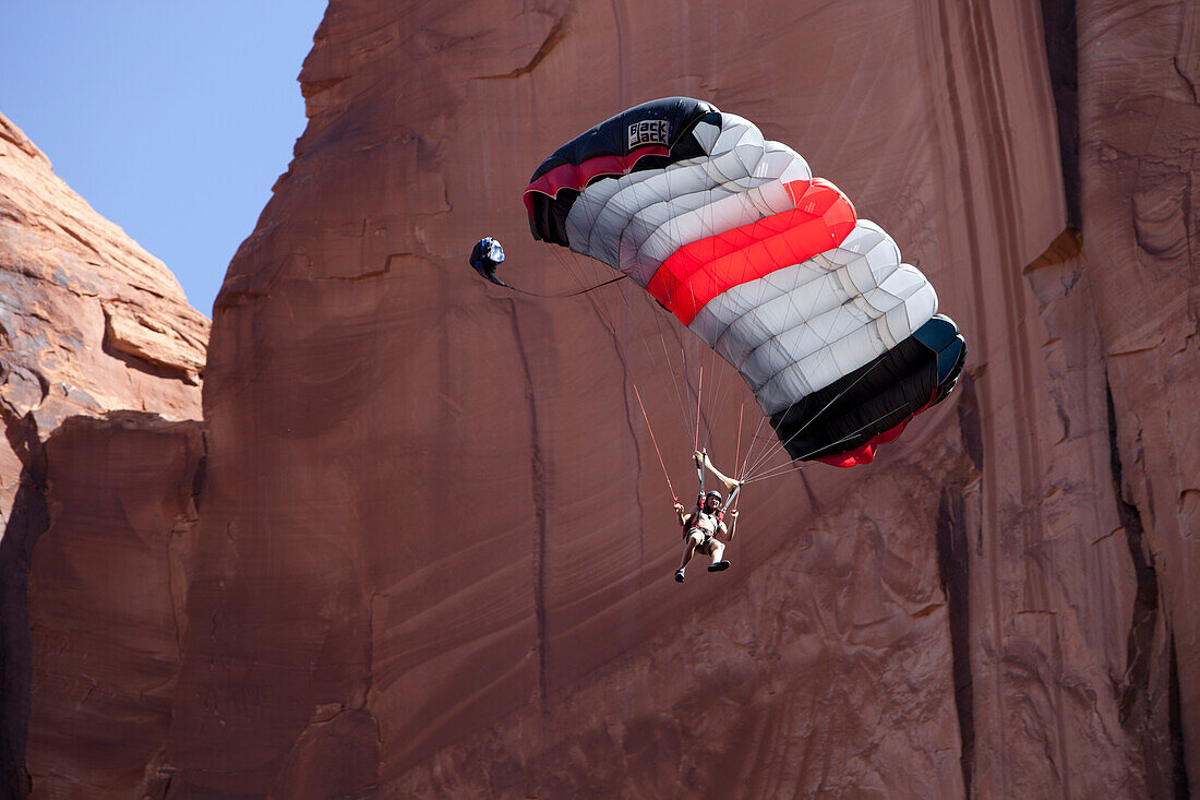 Andy Lewis base jumping off the Tombstone, Moab Utah