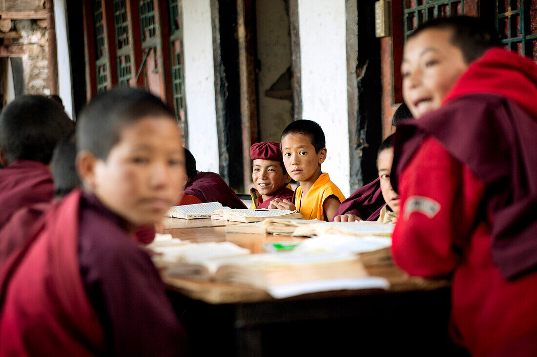 India, Jammu and Kashmir, Ladakh. Novice monks attending class at The Drukpa Kagyud Primary School. The school is part of Hemis Buddhist Monastery located 45 kilometers from Leh in Ladakh, Northern India.