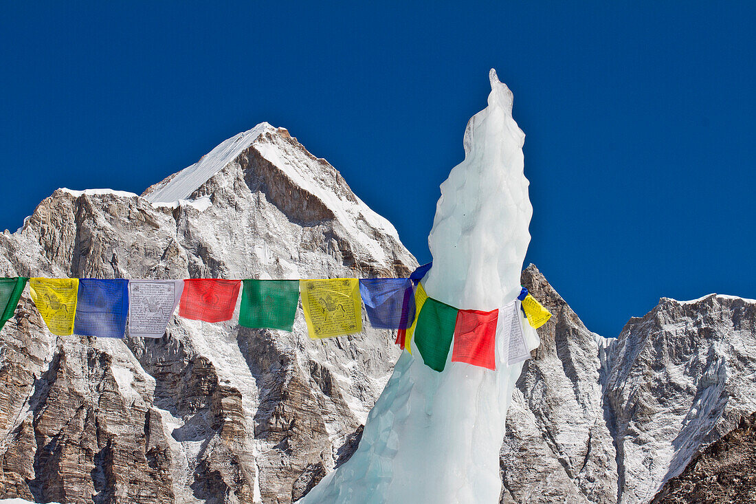 A prayer flag attached to a ice pinnacle at Everest Base Camp