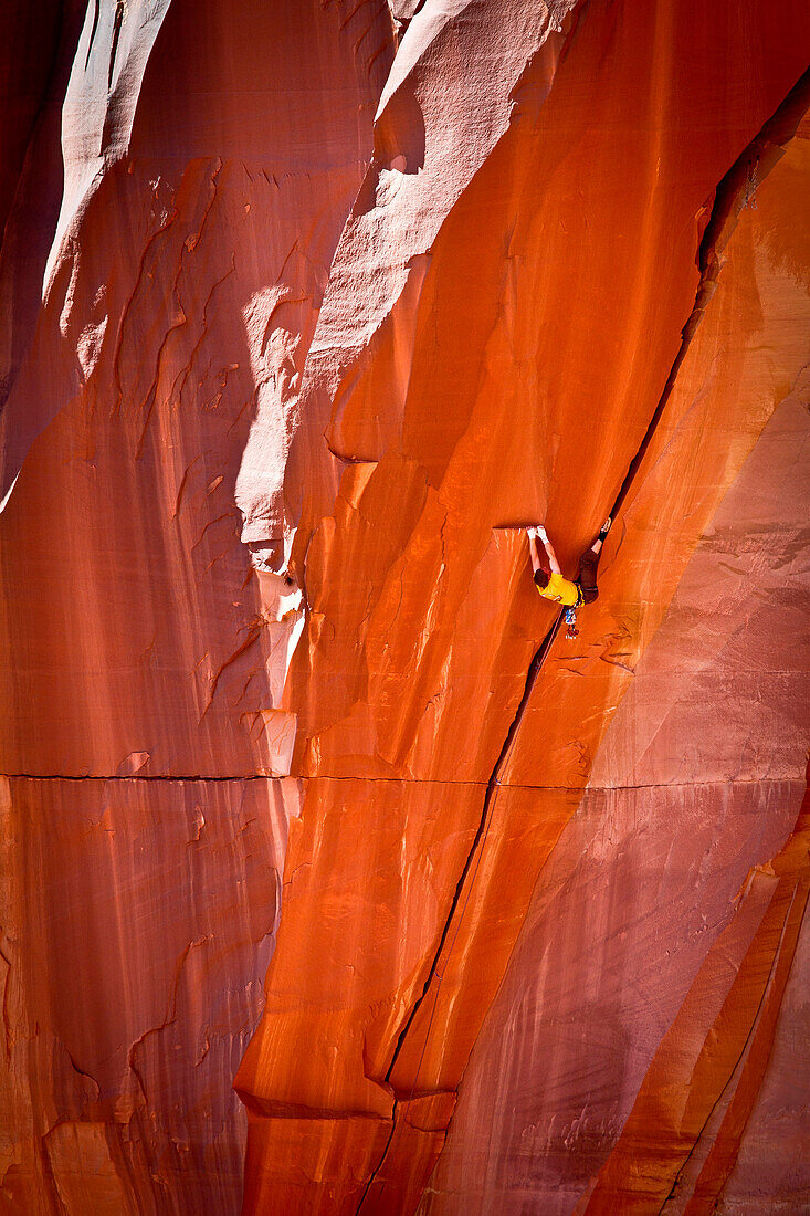 Peter Whittaker on the first flash ascent of Belly Full of Bad Berries Indian Creek 5.13a, Utah, USA.