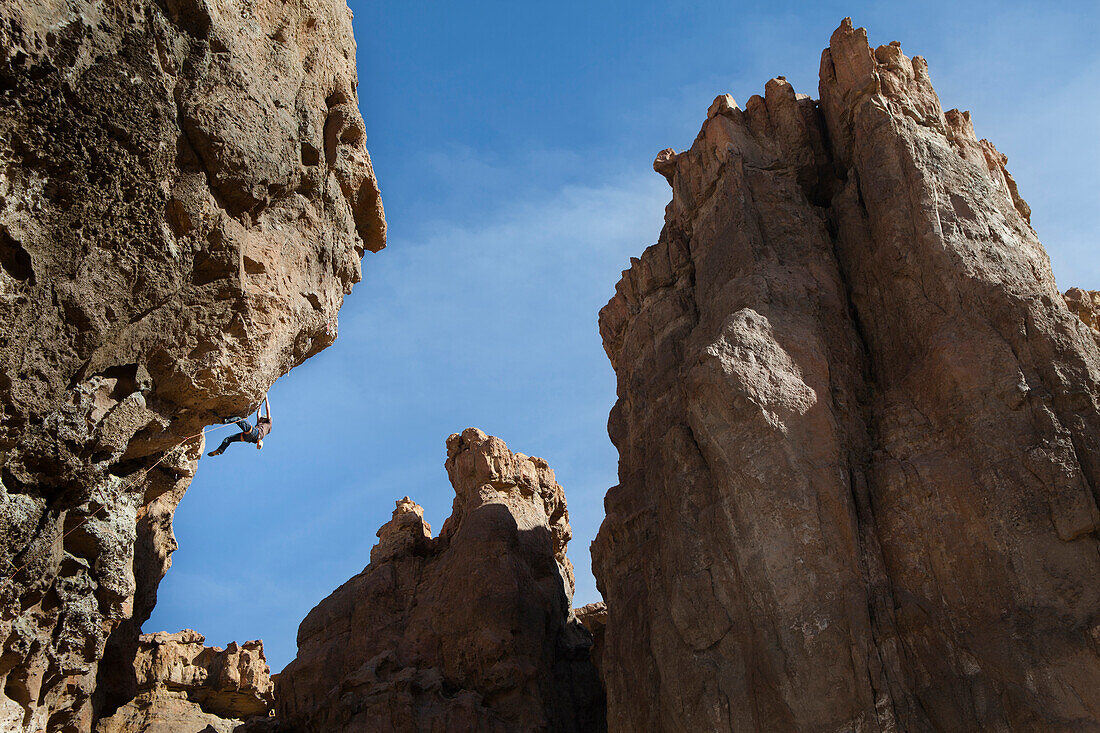 Rock climbing in La Buitrera canyon in Piedra Parada, Chubut, Argentina.