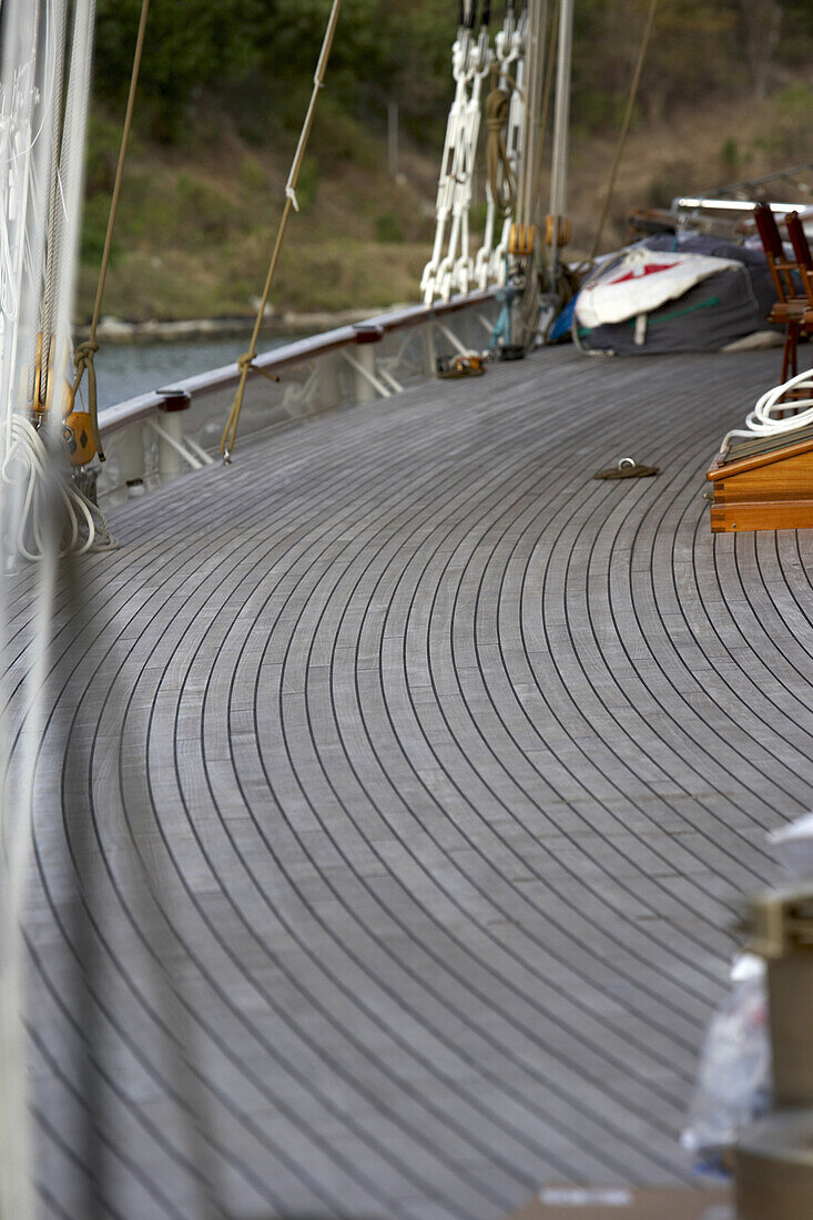 Early morning, tidy teak deck of sailboat, before departing to race in the Antigua Classic Regatta, 2006.  Alison Langley / Aurora 
