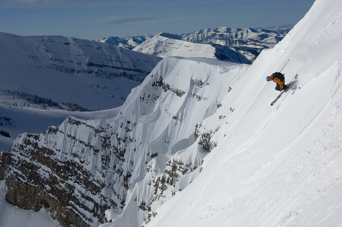 Eric Henderson , a professional ski guide, telemark skiing during the winter in the high alpine backcountry mountains of Jackson, Wyoming.  Jimmy Chin / Aurora Photos 