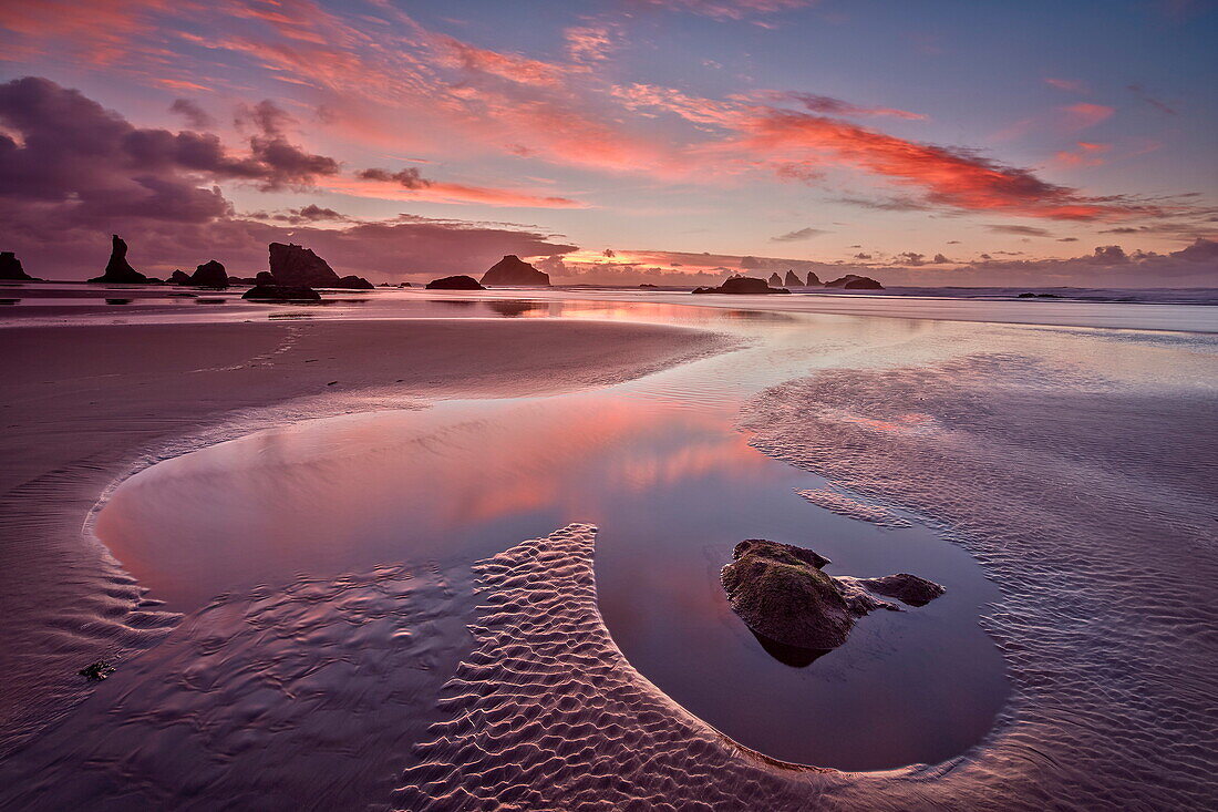 Sunset with orange clouds, Bandon Beach, Oregon, United States of America, North America