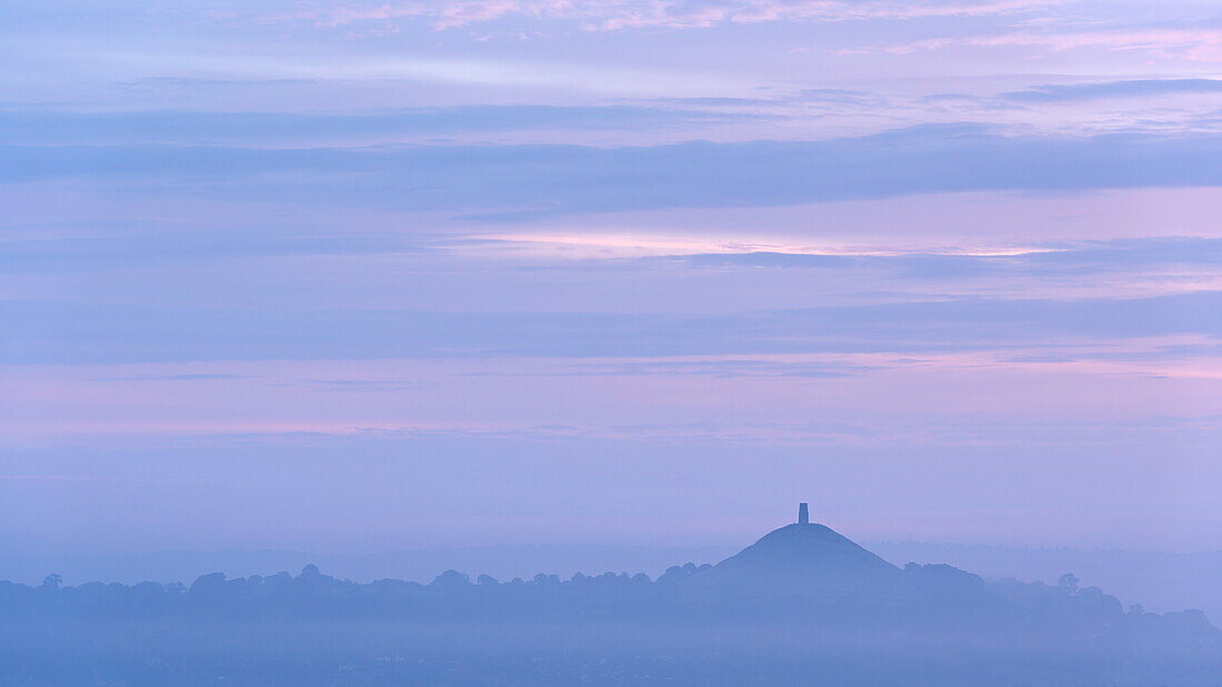 Glastonbury Tor on a misty summer morning, Somerset, England, United Kingdom, Europe