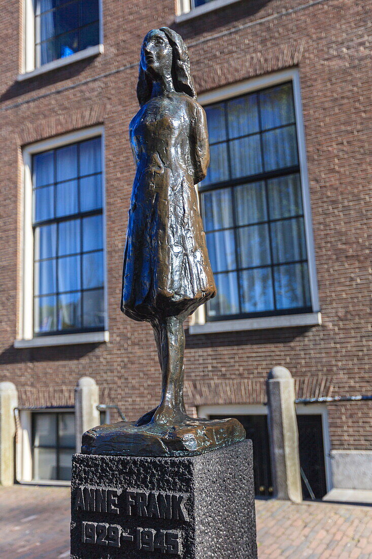 Statue of Anne Frank outside Westerkerk, near her house, Amsterdam, Netherlands, Europe