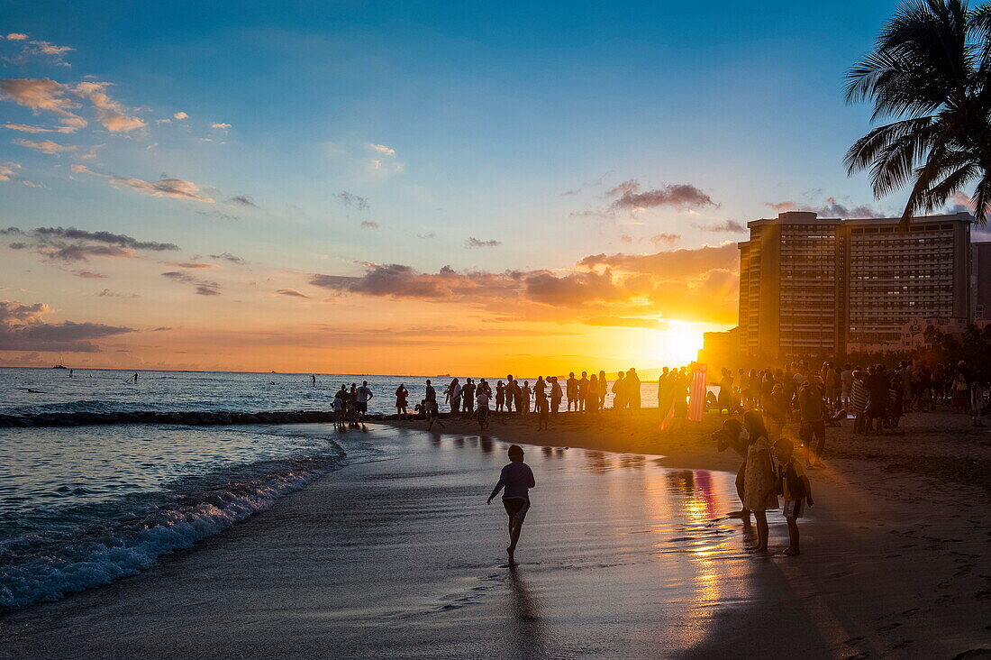 Sunset over the high rise buildings on Waikiki Beach, Oahu, Hawaii, United States of America, Pacific