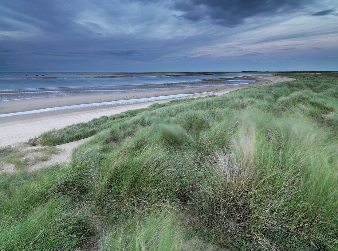 Twilight light in this view looking across to Scolt Head island from Brancaster, Norfolk, England, United Kingdom, Europe