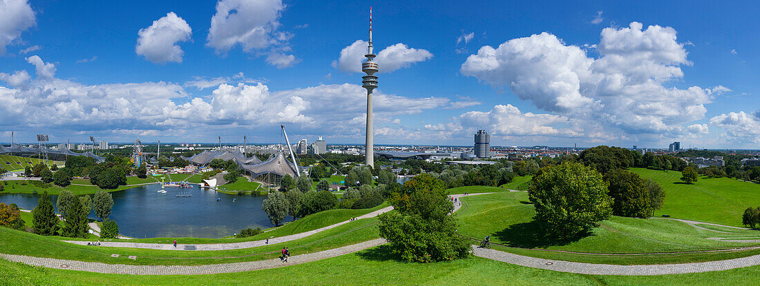 View from the Olympic Hill towards the Olympic tower and BMW Tower, Allianz arena and Froettmaniger Schuttberg in the background, Munich, Upper Bavaria, Bavaria, Germany