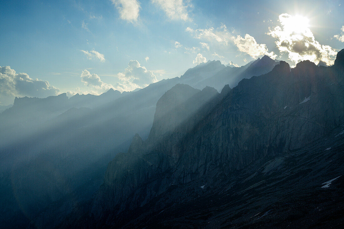 Beams of light over pinnacles, Sentiero Roma, Bergell range, Lombardy, Italy