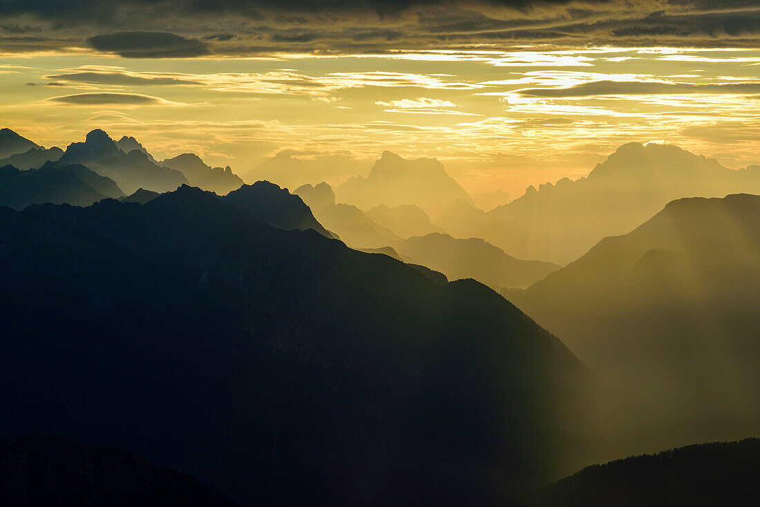 Clouds over Dolomites with Marmolada, Antelao, Pelmo and Civetta, Rifugio Torre di Pisa, Latemar range, Dolomites, UNESCO world heritage Dolomites, Trentino, Italy