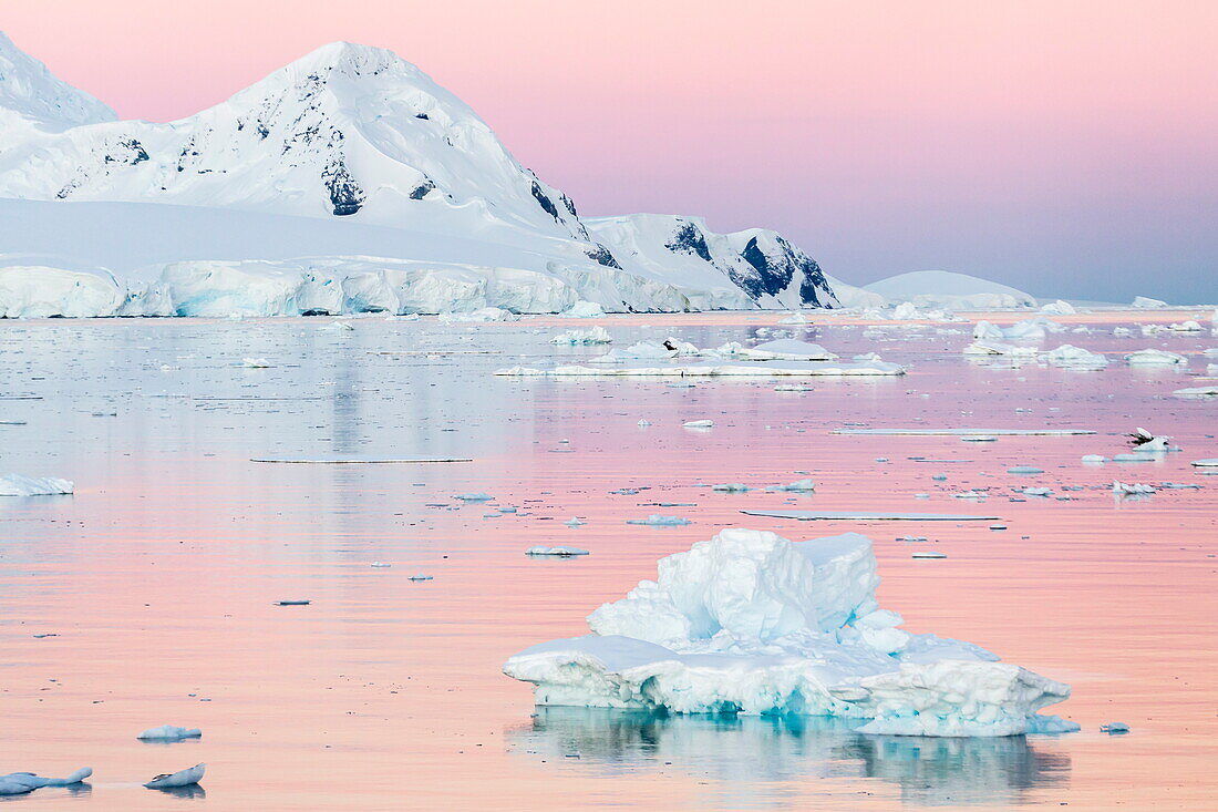 Sunset over icebergs in the Gerlache Strait, Antarctica, Southern Ocean, Polar Regions