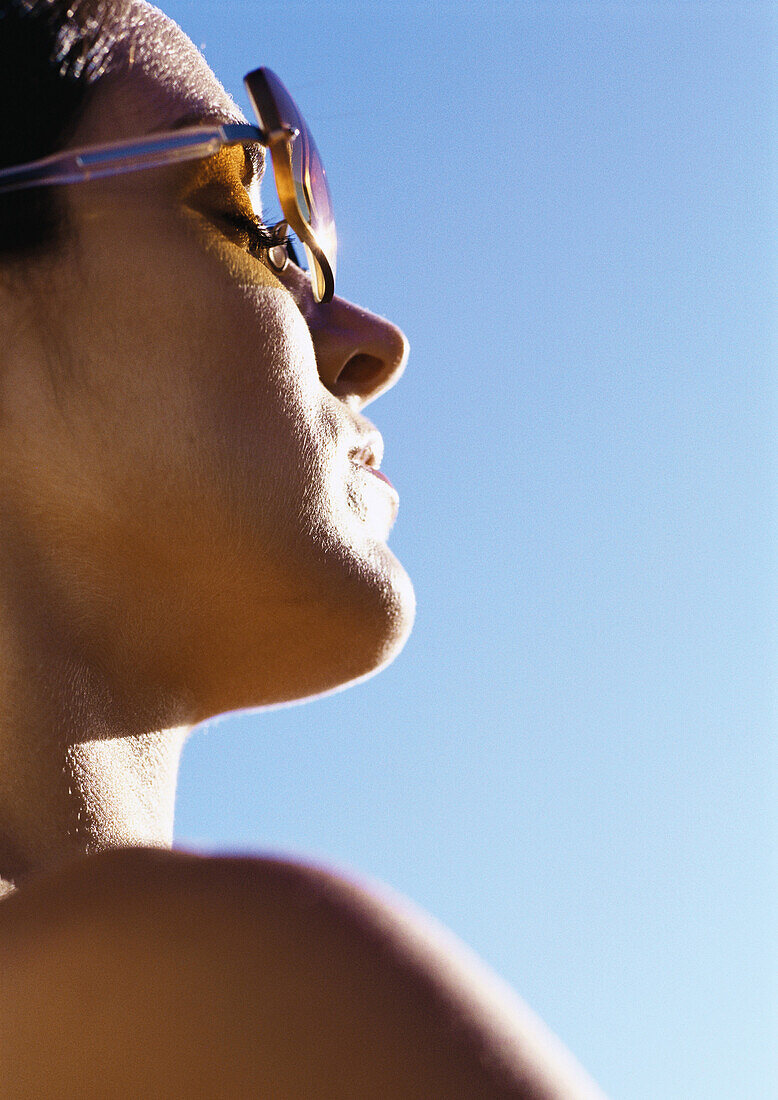 Woman wearing sunglasses, close-up