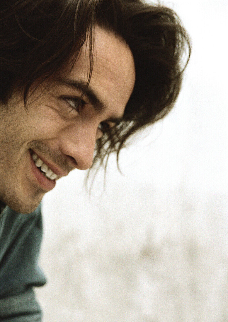 Man smiling, profile
