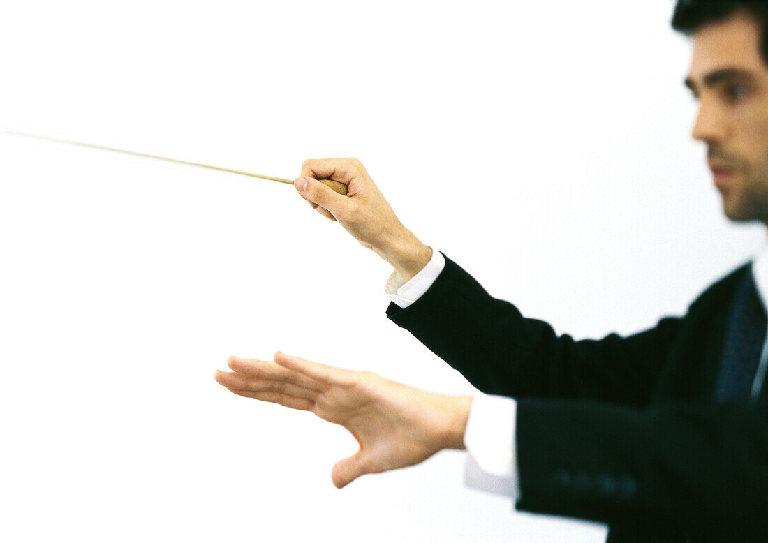 Orchestra conductor, side view