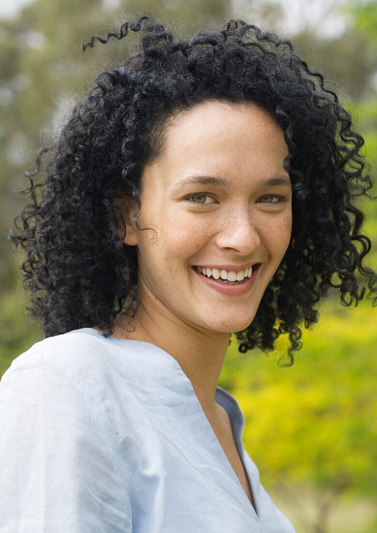 Young woman smiling, portrait