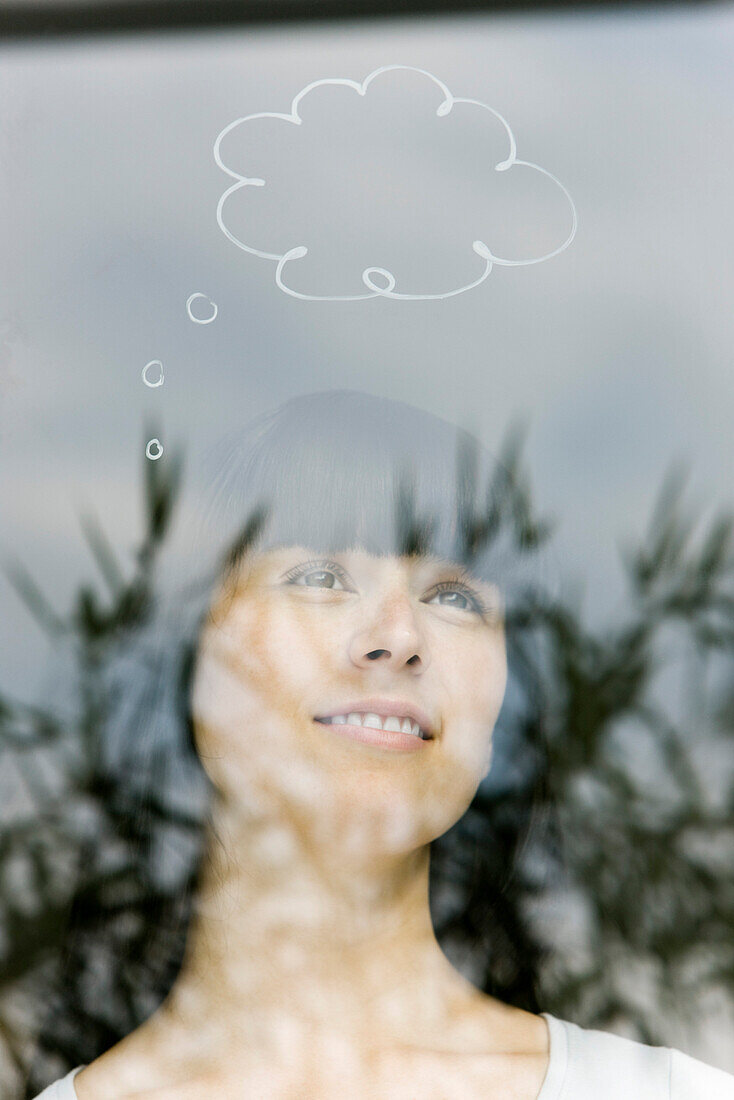 Young woman with thought bubble over head