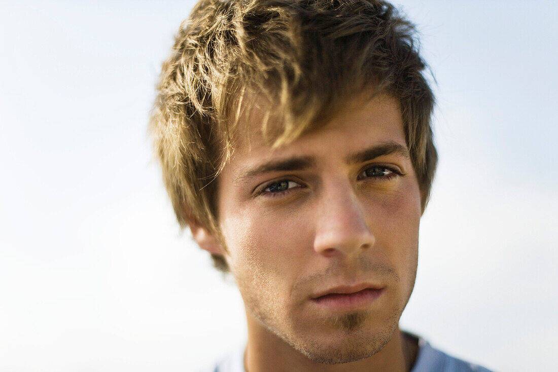 Young man looking at camera, portrait