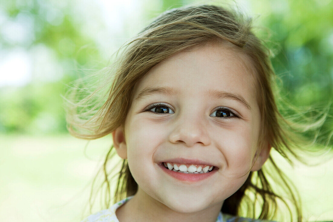 Little girl outdoors, portrait