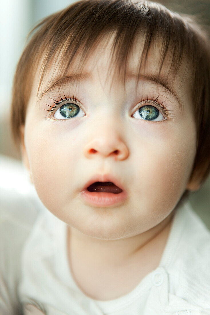 Infant looking up, portrait