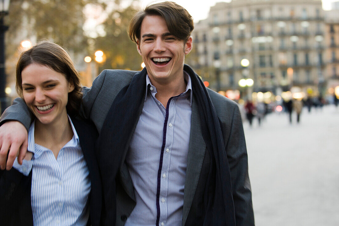 Couple walking on street together