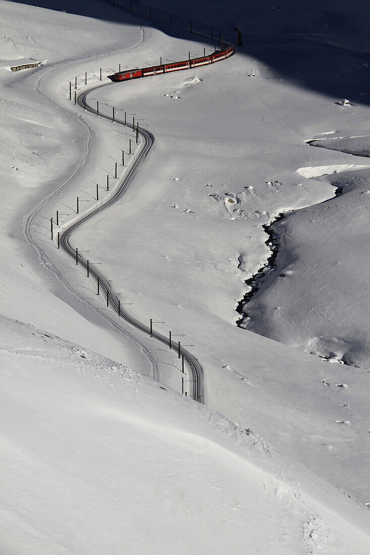 A train traveling through Oberalp Pass, Andermatt, Uri Canton, Switzerland