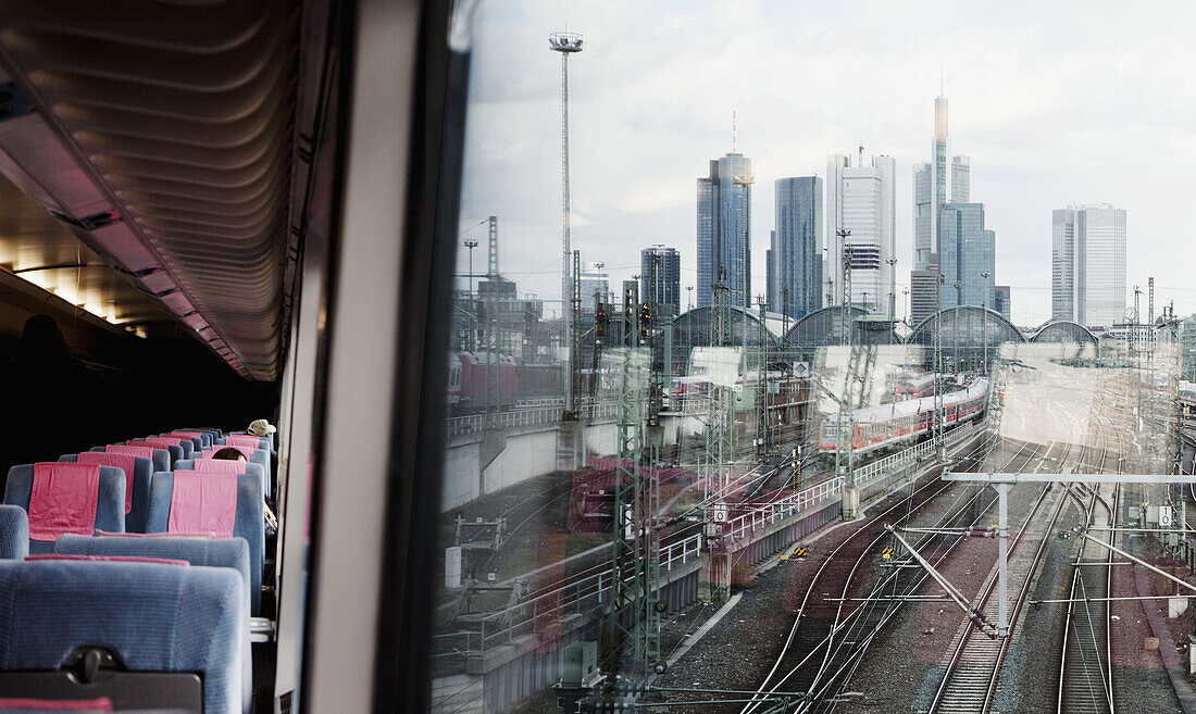 View through of a city through a train window, Frankfurt, Germany