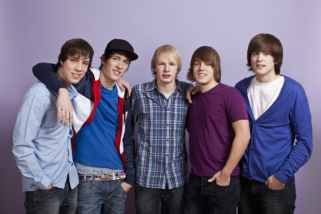 Five teenage boys, portrait, studio shot