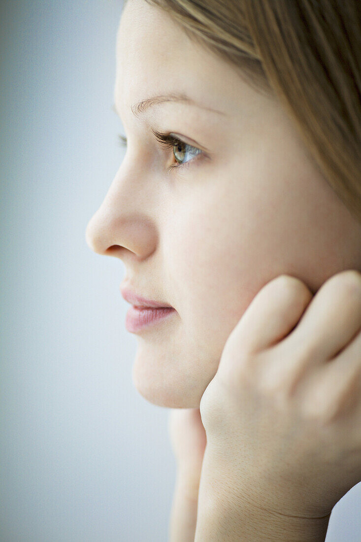 Daydreaming young woman