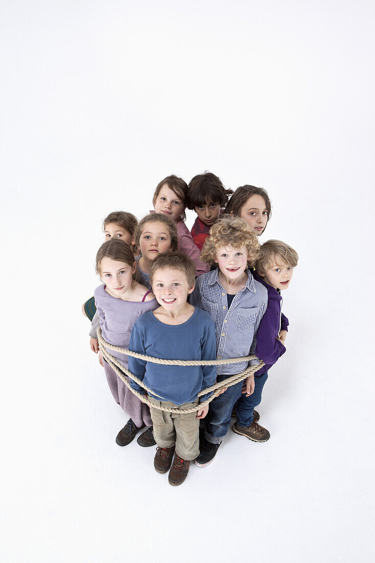 A group of kids tied together with a rope